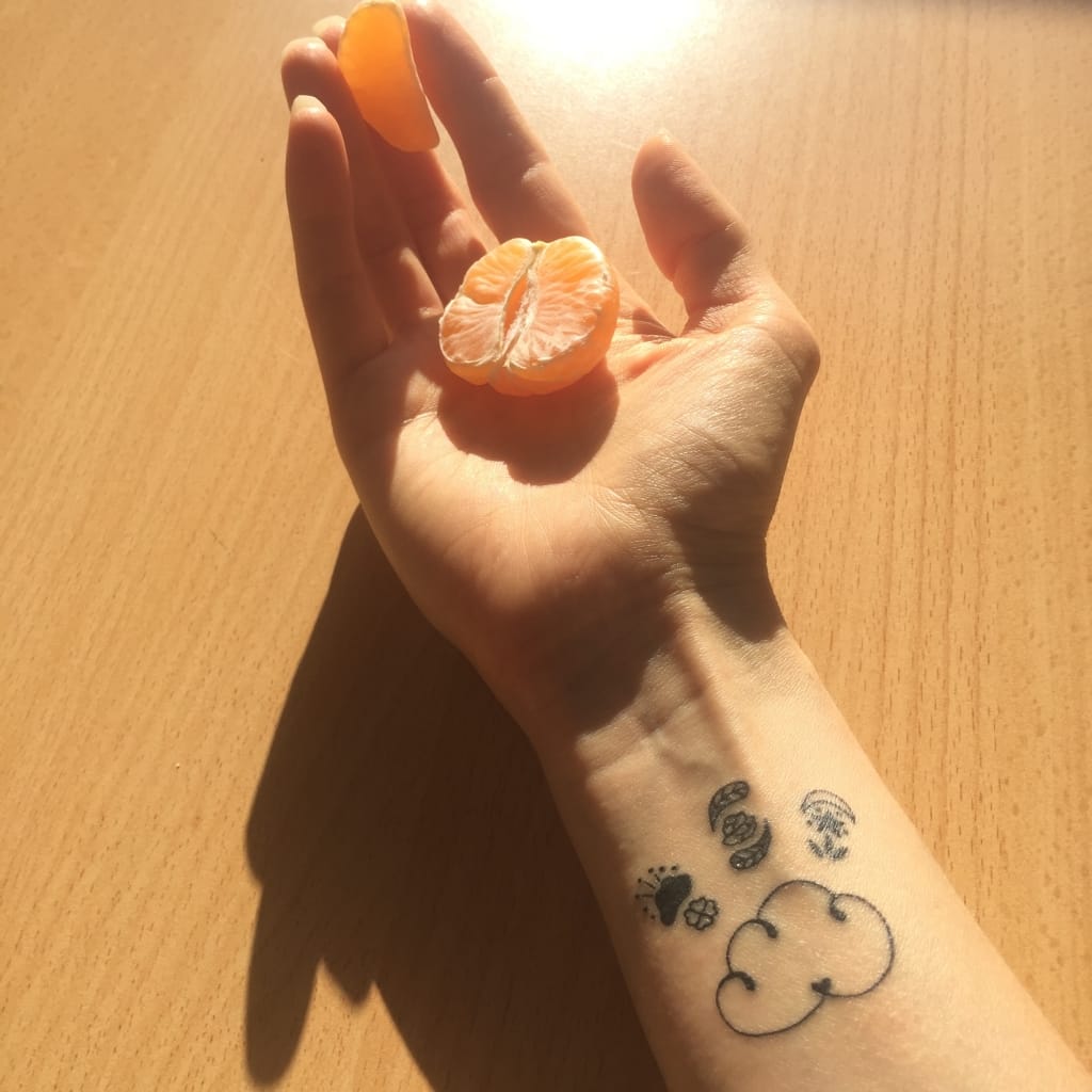 Tatouage mandarine